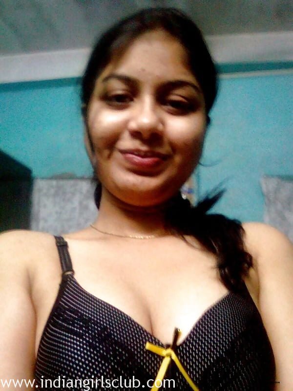 Indian teen squeezing her natural tits.