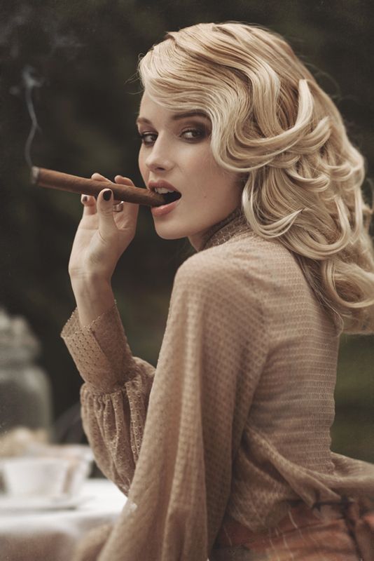 Woman smoking cigar