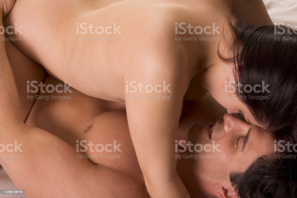 Naked couple with joint breasts and kissign